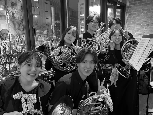 Photo exhibition and benefit concert IN Sanyodo Bookstore/Horn